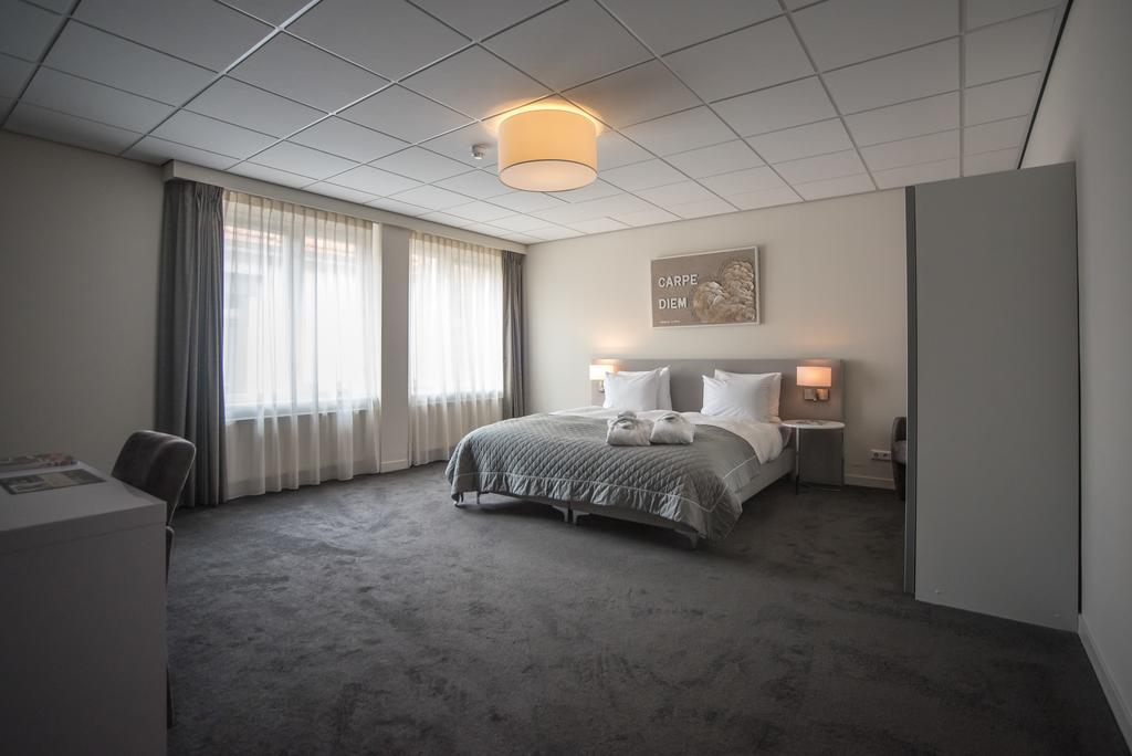 Hotel Het Raedthuys Sint-Maartensdijk Esterno foto