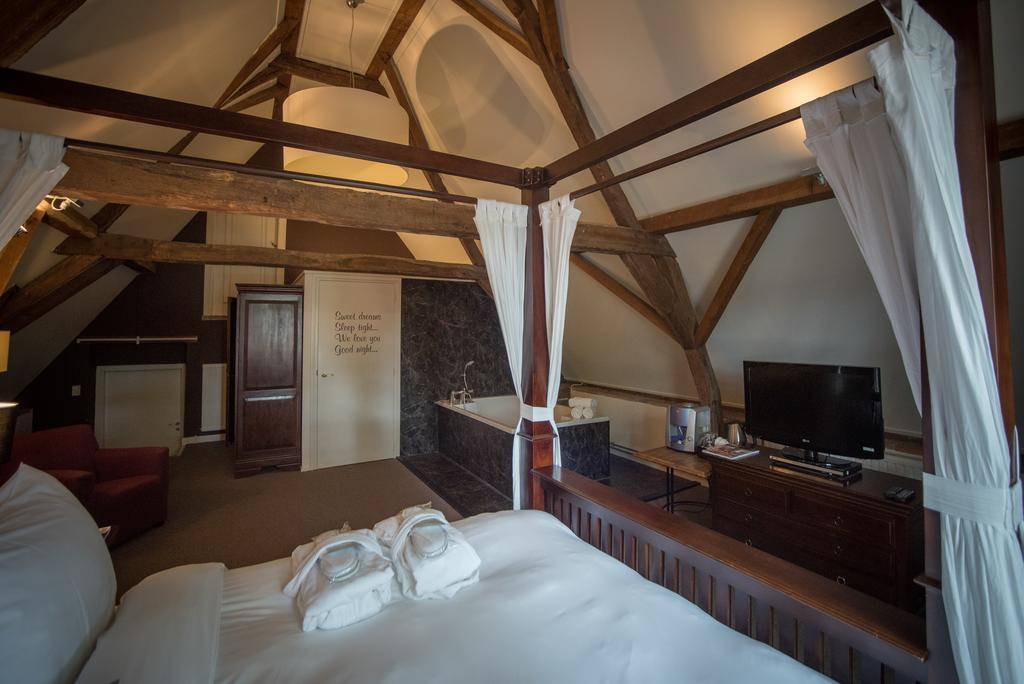 Hotel Het Raedthuys Sint-Maartensdijk Esterno foto