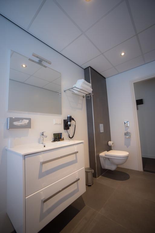 Hotel Het Raedthuys Sint-Maartensdijk Esterno foto