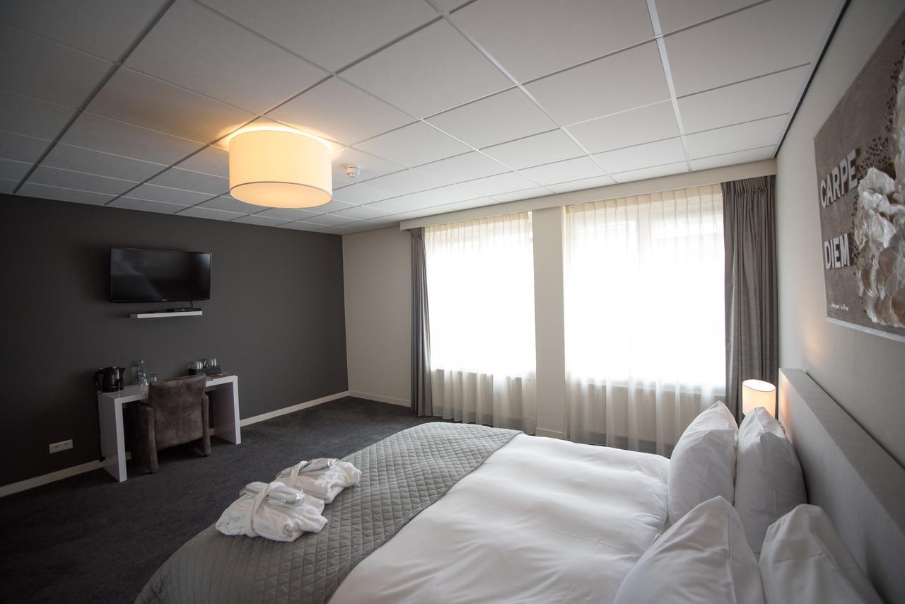 Hotel Het Raedthuys Sint-Maartensdijk Esterno foto